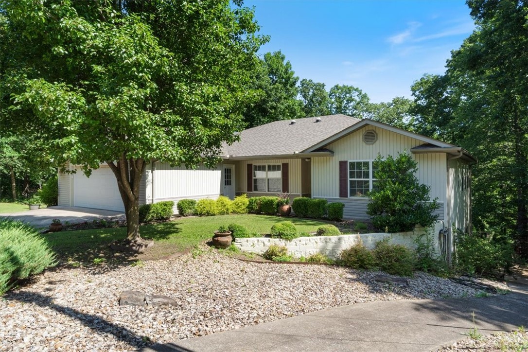 Immaculate quality home with a office/den in a private setting. Formal dining room plus eat-in space in the kitchen. 4th bedroom potential in lower level. Or it could be used as a Mother-in-law's suite. Over sized garage for toys or use as a work shop. Move- in ready. Biking trail at end of cul de sac. Great house for multi-generational family or Air BnB. In the Bentonville School District