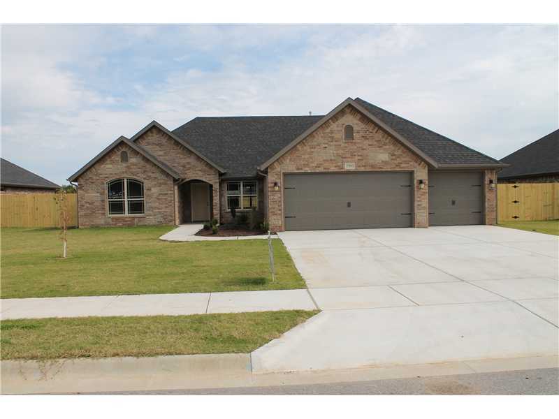 Under Construction possibly time to pick some interior colors. This all brick home has a open floorplan from the livig room to the kitchen to the formal dinning & has extras such as wood floors,blinds,granite countertops,custom cabinets,privacy fence,tile showers,fireplace,refrigerator,whirlpool tub
