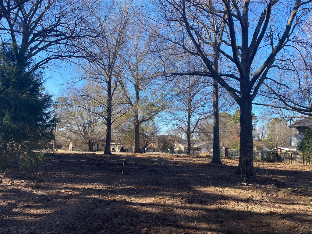 Great location to build your next investment! Large leveled 0.4 acre lot, with all utilities on site. Zoned RMF-40. Located near U of A, parks, schools, trails, downtown Fayetteville and quick access to I-49. Agent owned.