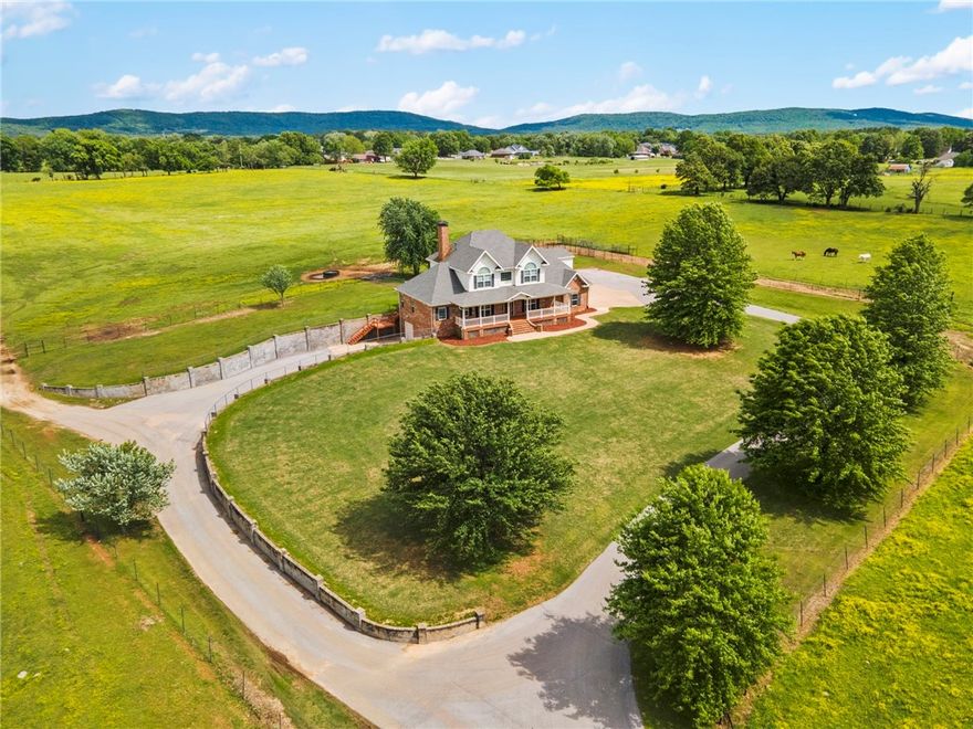 Welcome to this beautifully maintained, one-owner, custom-built farmhouse. Nestled on a peaceful stretch
of countryside, located in the middle of Farmington. This spacious home offers the perfect blend of privacy,
functionality and timeless style. The layout features a private office, two story living room open to the
kitchen & formal dining room. Upstairs there are 3 private bedrooms, 2 bathrooms and a bonus
room/5th bedroom. The primary suite is conveniently located on the main level and offers direct
access to the back deck, where you can relax and take in panoramic views of the surrounding farm. The
finished basement is ideal for a school room, gym, etc - it also includes an oversized garage providing generous space for storage, workshop needs, or future expansion. Whether you're looking for room to grow or a place to spread out and enjoy the country life, this property has it all. Don’t miss your opportunity to own this rare gem that offers space, seclusion
and the simple joys of farmhouse living!