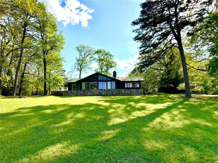 Opportunity awaits on 2 beautiful acres in Knoxville! This 1,895 sq ft single-story home offers 1 full bath and 2 half baths, a fireplace, and lots of space—but will require TLC to bring it back to life. The living room is a standout feature, with floor-to-ceiling windows that bring in natural light, a fireplace and sliding glass doors to a large, raised concrete patio overlooking the lawn. The property includes both an attached 2-car garage and an additional detached 2-car garage/workshop, offering plenty of room for vehicles, storage, or hobbies. Enjoy access to a community boat dock minutes away.

Whether you’re looking for a fixer-upper, investment opportunity, or a place to build your vision from the ground up, this property is ready for its next chapter. Bring your ideas—and your elbow grease—and unlock the potential waiting here.