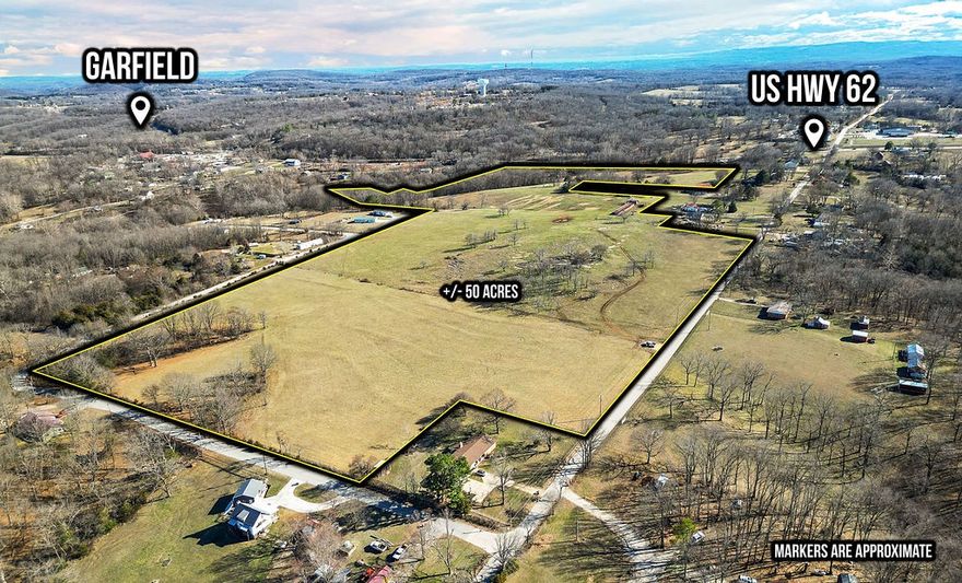 Great location just off of Highway 62.  Many possibilities for this 53 acre piece of land with road front access on 3 sides.  Property located about 15 minutes to Rogers, and about 15 minutes to Beaver Lake.  Located inside Garfield City Limits.