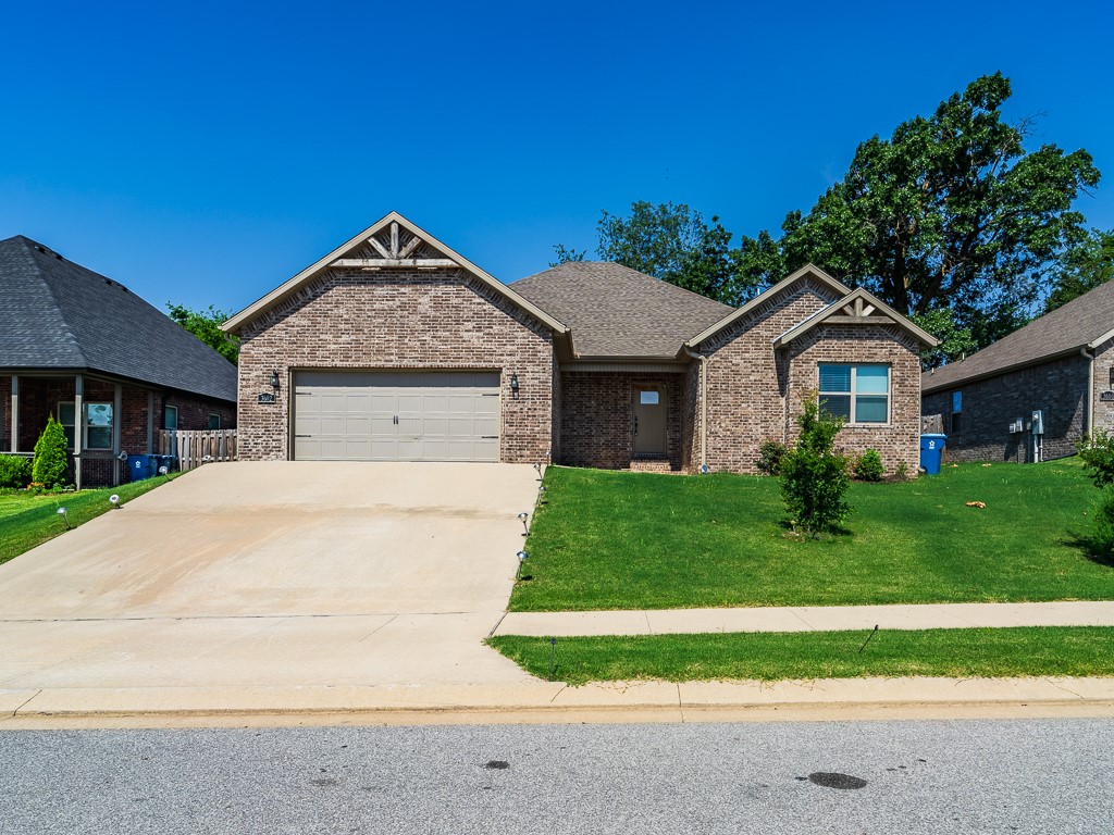 Lovely 4 bed, 2.5 bath home in desirable Willowbrook Farms Neighborhood. Close to schools, shopping, trails, and parks. Easy access to downtown Bentonville. Split bedroom plan with spacious living areas. Stainless steel appliance package and gas cooktop. Privacy fenced back yard with covered patio. Soaking tub in primary bath. Refrigerator conveys. Washer and dryer provided for convenience only. Pets considered with additional deposit. All adult occupants must complete application. $50/person to apply.