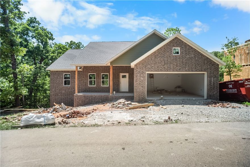 Well-located west-side Bella Vista home offering quick access to I-49 while keeping you close to the best local amenities. Enjoy nearby Branchwood Recreation Center with its newly updated fitness, pool, and walking paths, plus the Lake Lomond boat ramp just minutes away for easy days on the water. A comfortable layout, peaceful surroundings, and convenient access to trails, golf, and shopping make this an ideal Bella Vista address.