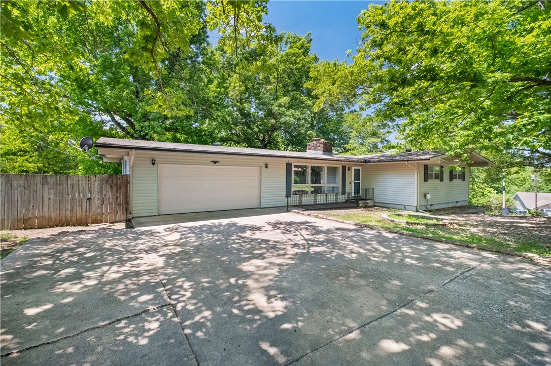 Nestled in the heart of Bella Vista, this 3-bedroom, 2-bath home offers the perfect blend of nature and convenience. Just steps away from scenic bike trails, Lake Avalon, and the beach area, outdoor enthusiasts will love the easy access to kayaking, hiking, and serene natural beauty. Enjoy quiet living in a growing community, all while being just minutes from city amenities. This home features a bright sunroom—perfect for relaxing or entertaining. Don’t miss your chance to own a slice of paradise in one of Bella Vista’s most desirable areas.