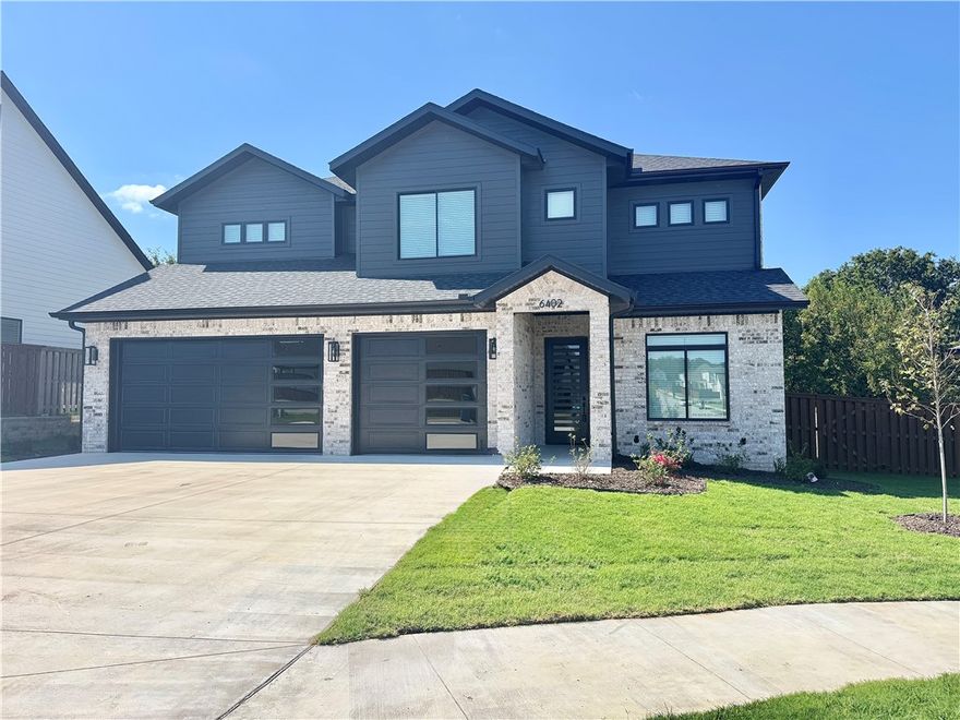 Modern home in sought after community of Aurora. Stunning living room with tiled linear fireplace, custom beams, wood floors, tons of light streaming through ample amount of windows & open floorplan. Kitchen features large island with custom stain, stainless steel appliances, gas cooktop, custom cabinets, double ovens, pot filler, quartz countertops & backsplash, massive walk in pantry & storage! Home also features a secondary bedroom on the main level. Spacious, private primary bedroom with luxurious primary bathroom. Primary bath with double vanities, walk-in tile shower & stand alone soaking tub. Upstairs features three large bedrooms & a bonus room with wet-bar. Covered patio overlooking the large lot! Aurora residents have access to TONS of community amenities. Adult pool, family pool, bike repair station, dog park, elevate fitness course, sports court open air clubhouse and playground! Internet included in POA! $3,000 preferred Lender credit to Buyer for closing cost etc.