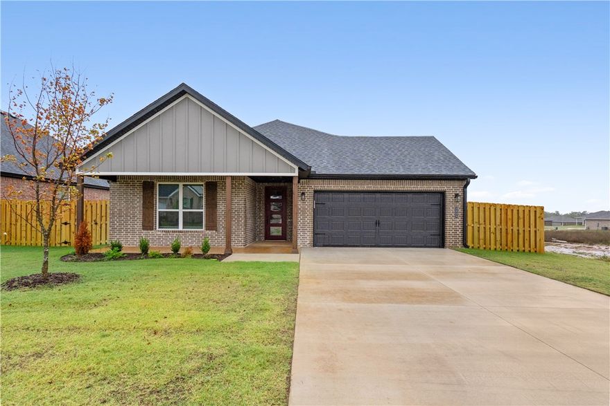 Pea Ridge welcomes you to its rapidly growing community. The Yorktown subdivision places you at the heart of it all, offering close proximity to schools, parks, and beautiful scenic views.This lot showcases the Cardinal Plan, where you're welcomed by LVP flooring and bright, airy touches that bring the home to life. All bedrooms are conveniently located on one side of the house, with two bedrooms and a bathroom at the front, while the primary suite is tucked at the back, next to the laundry room and two extra storage spaces. The kitchen, living, and dining areas flow seamlessly together, with the kitchen offering ample storage, including a walk-in shelved pantry. Enjoy outdoor living with both covered front and back patios