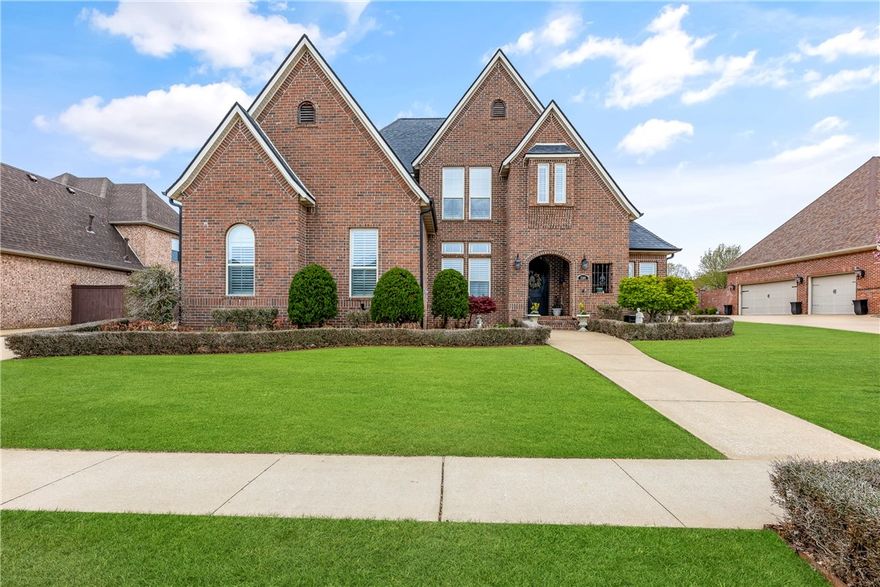 This elegant residence offers an array of luxurious amenities to elevate your lifestyle. Two ensuite bedrooms & a bonus room upstairs, downstairs: spacious primary bedroom suite, 4th bedroom & a bath w/access to your own private oasis. Perfect for entertaining, covered patio, a sparkling saltwater pool & spa. Family centered kitchen, ideal for culinary delights, w/walk-in pantry, is open to an inviting family room exuding warmth & sophistication w/custom plantation shutters & crown molding. Seamlessly flow into intimate dining & living areas, an office, just off the impressive entry w/gleaming hardwood floors & a curving staircase.  This jewel is nestled near shopping, The AMP, Top Golf, Blossom Way Trail, Rogers High School & Haas Academy.  See Today!!