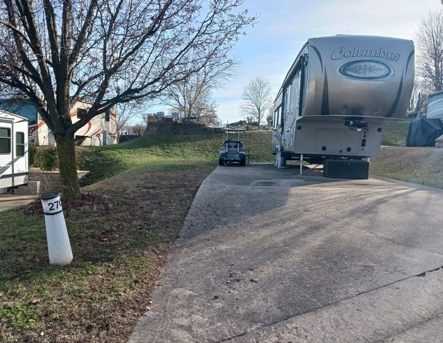 Simplicity with this back in Lot at a fantastic Price! Lets start the new year the right way .. Its Lake Time! Level concrete Pad at the Ozarks Luxury Resort offers prestige shore access on Table Rock Lake. Lot #270 will accommodate upto 40 ft on the recreational vehicle unit with full hook ups on site. Short 30 minute drive to Branson Missouri. HOA fees include some outstanding membership benefits of 2 pools, pickleball, tennis courts, 10 slip courtesy dock and fully equipped bath/laundry house.