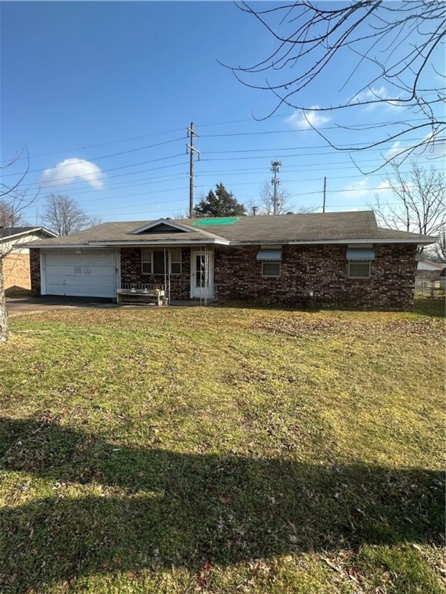 Come see this 1970's RETRO BEAUTY.....it's like stepping back in time. Want to remodel a house? Play HGTV in REALITY? House needs some work. Have you got what it takes? Come find out! Charming 70's build in desirable location in Springdale. Covered porch, flat yard, awesome front door. You're just gonna LOVE IT!