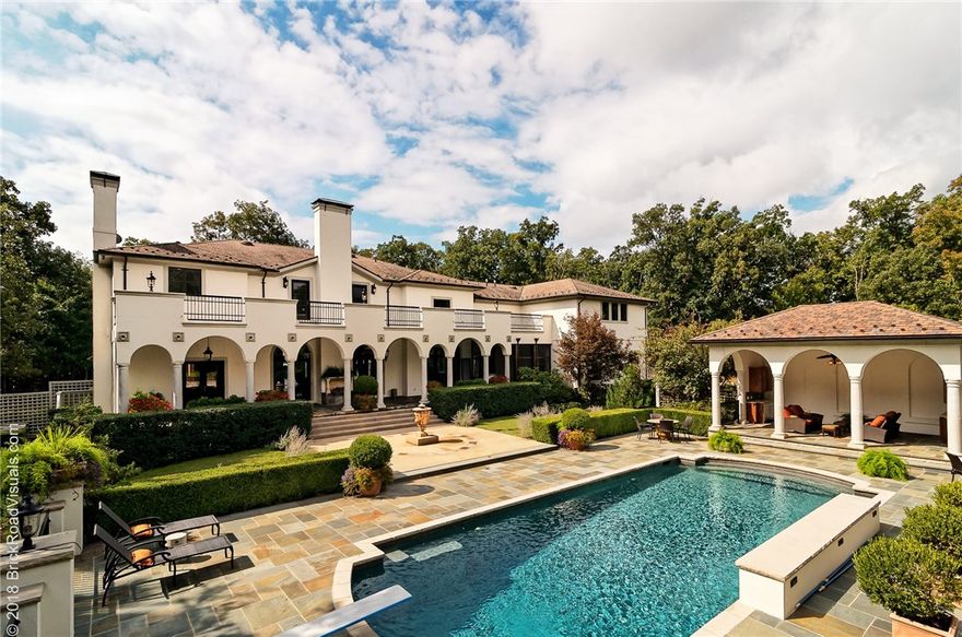 Stunning architecturally significant estate property on 5.3 acres.  Breathtaking setting with park like grounds professionally landscaped by DK Design, Luther Stem salt water pool, Loggia with grilling area.  Plethora of hosting and entertaining opportunities with completely remodeled elegant interior and exterior by Christopher Todd Designs!  Luxurious interior spaces with an open concept living, dining and kitchen.  French doors leading to expansive balconies overlooking the pool with fountains, beautiful landscaping and slate tile surround.  Exercise room, screened-in sun porch, bonus room and game room... this home has it all!