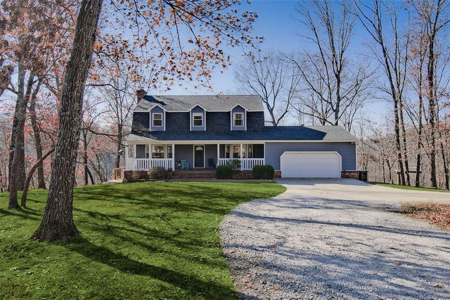 Nestled on 10 serene wooded acres, this charming farmhouse offers privacy and modern amenities, just 10 minutes from town! Enjoy complete seclusion and the rare opportunity to explore the natural beauty of your own land! The spacious kitchen is truly the heart of the home, featuring a professional-grade Wolf double oven, butcher block countertops, and plenty of space for cooking & entertaining. The main level boasts stunning oak floors & abundant natural light with breathtaking views. Relax on the newly built deck, or cozy up by the wood-burning stove on cooler evenings. Enjoy peace of mind with updated major utilities and home features, including a new roof, two new HVAC systems, water heater, & new exterior siding. The finished (exterior access) walk-out basement adds 520 sq. ft. of versatile living space not included in total square footage, while a 30x40 garage/shop offers ample storage. Whether you dream of a small farm or star gazing on a peaceful retreat, this property is the perfect canvas for your vision!