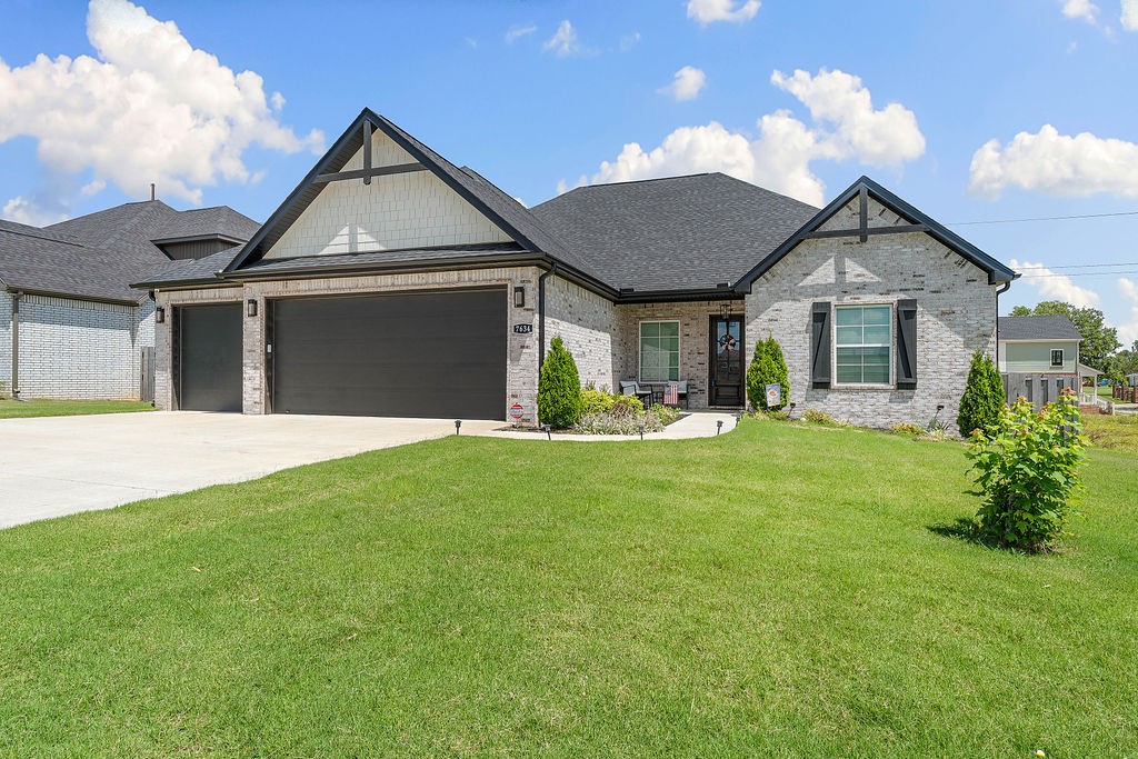 Donāt miss this gorgeous all-brick home in West Springdaleās Benedetto subdivision. Enjoy the phenomenal custom-built outdoor living space with multiple seating areas, built-in refrigerators, sun shades, gas fireplace and a built-in firepit. Tons of space for grills, smokers, and all of your BBQ equipment! The home's interior has high-end features like custom cabinets, quartz counters, Frigidaire Pro appliances, 8' doors and wood flooring throughout the main living, dining, kitchen and primary bedroom. Extras include a tankless water heater, 8' insulated garage doors, fenced yard, gutters, blinds, and irrigation system. The large laundry room conveniently connects to the primary bedroom. Enjoy neighborhood perks like a pool, sport court, pickleball, and basketball. Come see what makes life in Benedetto so special!