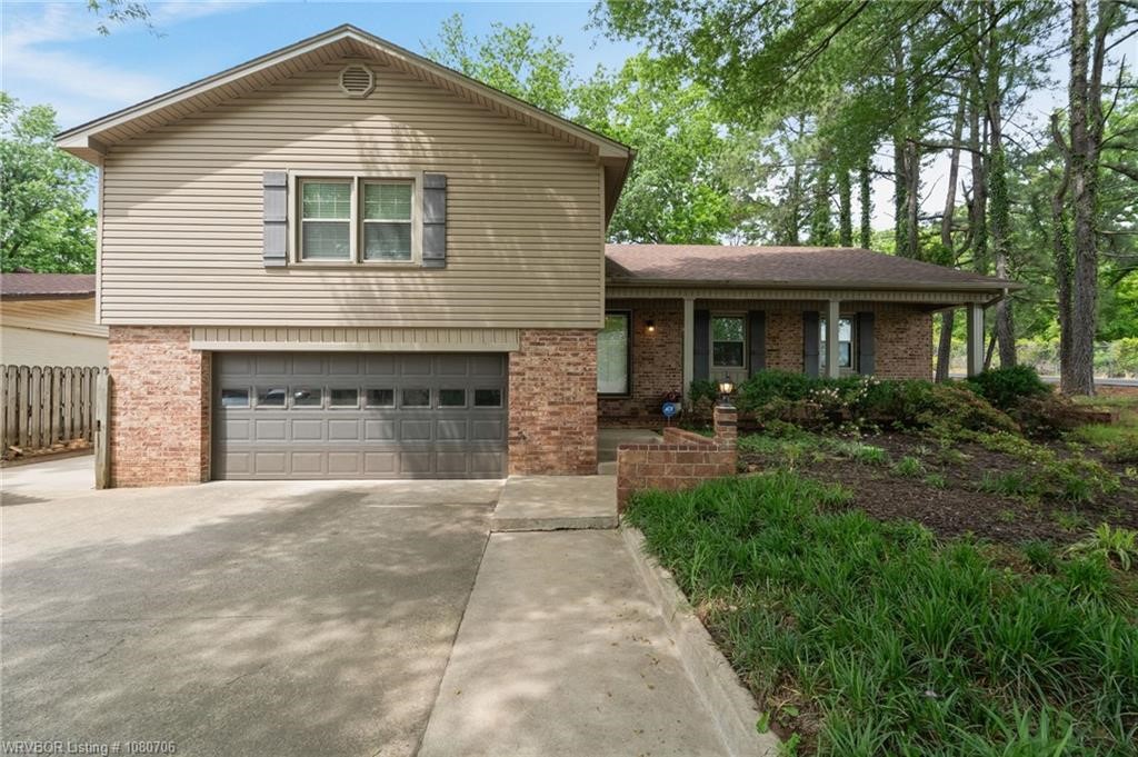 Beautifully maintained home offers the perfect blend of comfort, functionality, & style-just minutes from schools, shopping, & parks. Fresh paint on the walls, trim, & doors creating a bright & inviting atmosphere. Stunning kitchen with granite countertops, a custom backsplash behind a glass stovetop, freshly painted cabinets, & a coffee bar. The eat-in kitchen is complete with a cozy fireplace. Spacious living area that also has custom built-ins, the new engineered hardwoods are beautiful. Upstairs you will find four spacious bedrooms, including a master suite with elegant custom built-ins and ample space to relax and unwind. This level also includes two full bathrooms for added convenience. Downstairs, you will discover a cozy family room with a second fireplace, a laundry area, and a half bath. Spacious backyard, where mature trees provide plenty of shade and a large patio offers the ideal space for entertaining. Fenced in storage area perfect for your RV or boat with additional storage in a lean to.