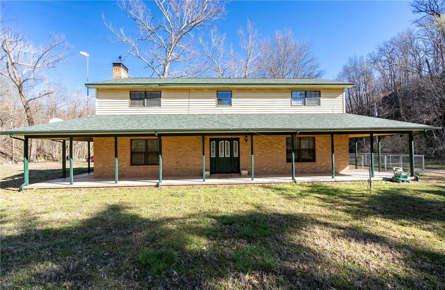 If you are looking for a spacious home in the country with some acreage, you will want to take a look at this home.  The kitchen has been totally remodeled with new cabinets and solid surface, Impervicoat,  countertops.  The current owners made lots of upgrade/improvements when they purchased the home.  It has a separate dining room and eat-in kitchen.  No Carpeting.  Relax by a cozy fire in the living room with a wood burning fireplace.  All located on 28.91 acres.  The spring-fed well offers fresher tasting water with naturally occurring minerals.