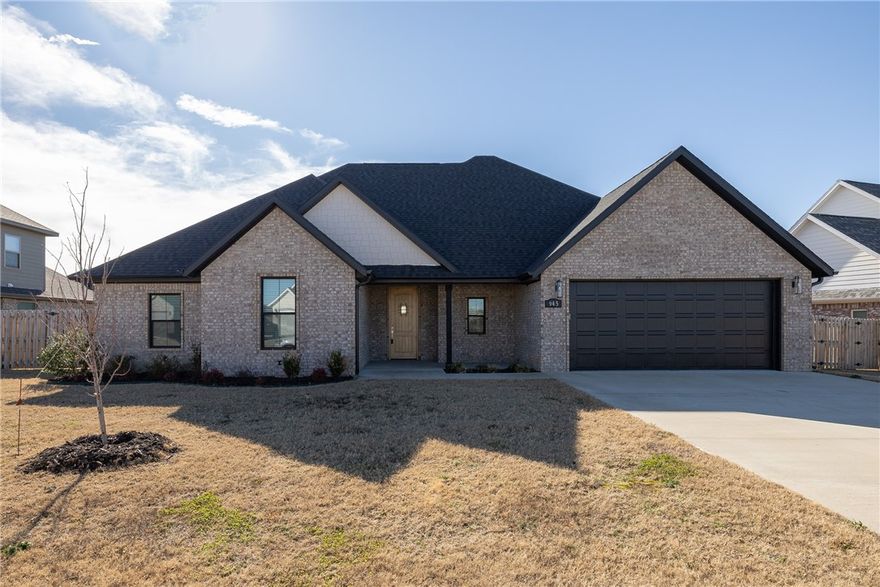 Adorable MOVE IN ready home in Tontitown’s South Pointe S/D. 2,520 heated and cooled sq ft offers 4 bedrooms, 3 full bathrooms, open eat in kitchen to living, dining, bonus room, and a laundry room. Amenities include luxury vinyl plank flooring, vaulted ceilings, quartz counter tops, gas range, stainless appliances, 2” faux wood blinds,  gas log fireplace in the great room, fully privacy fenced backyard, covered patio, and a 2 car garage. The only room upstairs in this home is a bonus room so most of the living is on the first floor!!!! Zoned for Harber High School!