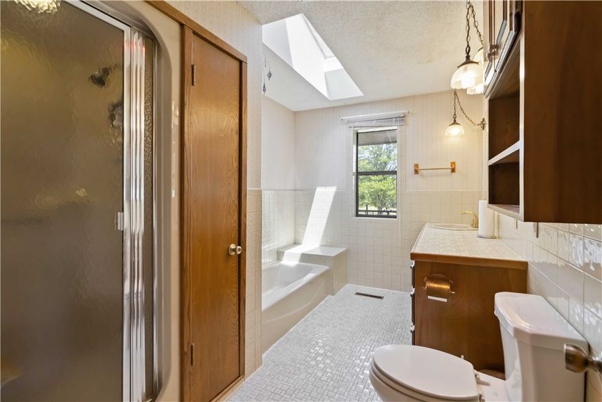 This 69.70 acre tract in South Fayetteville has an exceptional blend of rural beauty, endless views, development potential, and modern living. Located less than a mile from I-49 and minutes from the downtown square and the U of A, the property features gently rolling terrain with open meadows, wooded sections, and offers seclusion and privacy.A striking contemporary 3-bedroom, 2-bath home built with steel I-beam construction and native rock sits on the property, providing a comfortable residence or guest retreat while you enjoy or develop the land.This land offers a variety of uses from a private estate or recreational retreat to long-term investment or residential development. Access will be via a recorded easement . refer to mls listing 1317564