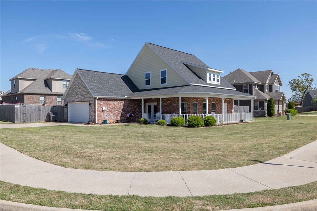 Do not miss this opportunity! This 3 bedroom 2.5 bath home in Cave Springs is only six minutes from the I49 Lowell Exit. It sits on a large corner lot with just a three-minute walk to the community pool and playground. It is also very close to Mt. Hebron Park, the top-rated Janie Darr elementary, and provides easy access to the the Pinnacle Hills shopping/entertainment area. Everything you need is within a 10-minute drive, but you get the quiet feel of the country! Well maintained and move-in ready.
Wrap-around front porch, open floor plan, wood floors, granite countertops, spacious dining area, and a living room that is perfect for entertainment! Downstairs master bedroom, half bath, and laundry room.
The upstairs features two large bedrooms with built-in desks, a spacious bathroom, and an open area at the top of the stairs that could be very useful as either a kids play area or a movie/video game area as there is plenty of room for a sofa and chair.
Fenced in back yard with back patio and storage shed