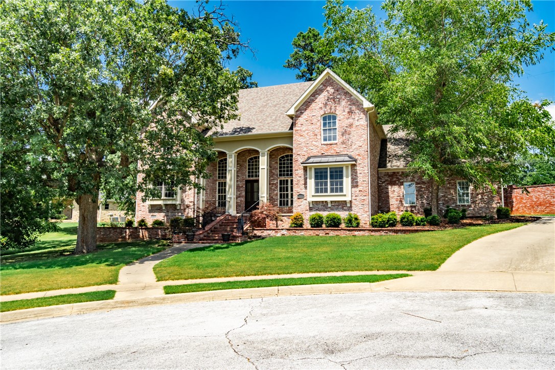 Welcome to this stunning home in a gated subdivision in Springdale! With 4,069 sqft of living space, this 4 bedroom, 3.5 bathroom home offers plenty of room to spread out. Two of the bedrooms are master suites, providing extra comfort and privacy. The home features three spacious living areas and a cozy fireplace in the main living room. You'll love the tall ceiling in the entryway, which lets in lots of natural light, and the beautiful hardwood floors throughout. Located in a peaceful cul-de-sac, this home is a perfect blend of elegance and comfort. Don't miss your chance to see it!