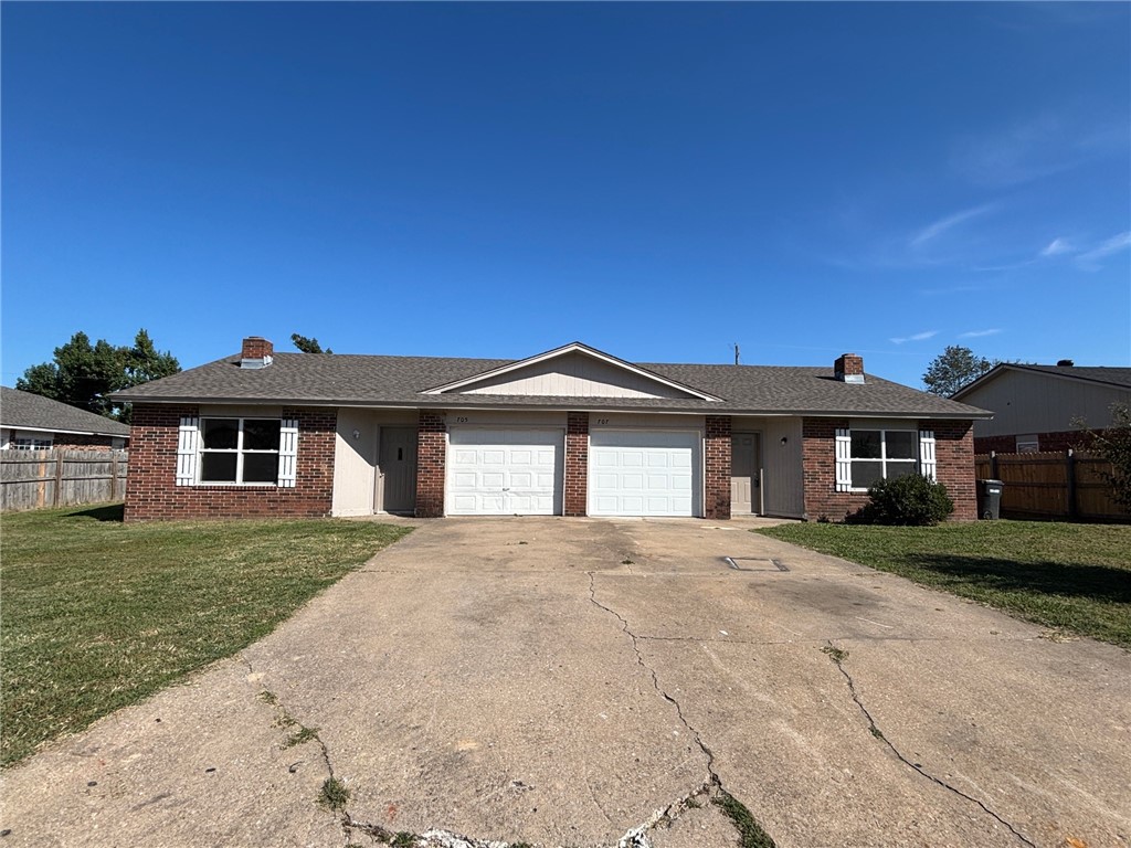 Cozy duplex located just minutes from I-49. The kitchen is spacious and offers modern appliances and ample cabinet space, and the in-unit washer and dryer add everyday convenience. The home includes an attached one-car garage that offers secure parking and additional storage. Central heating and air provide year-round comfort!