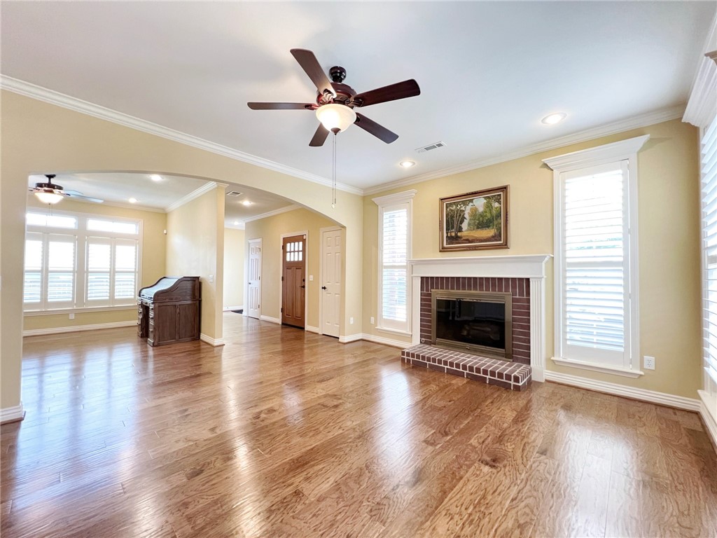 There are so many things to love about this one! This charming all-brick home boasts hardwood floors, large kitchen, plantation shutters, premium crown moulding, two living areas, brick fireplace, built-ins, fully remodeled master bath, tray ceiling in master bedroom, full sized laundry room, tons of storage, oversized 2 car garage, fully fenced back yard with mature trees, back deck with retractible awning, and adorable side patio with a raised bed for your favorite flowers or herbs. Did I mention it's handicap accessible? What a great location, convenient to parks, trails, schools and amenities. Come see it today, you might just fall in love!