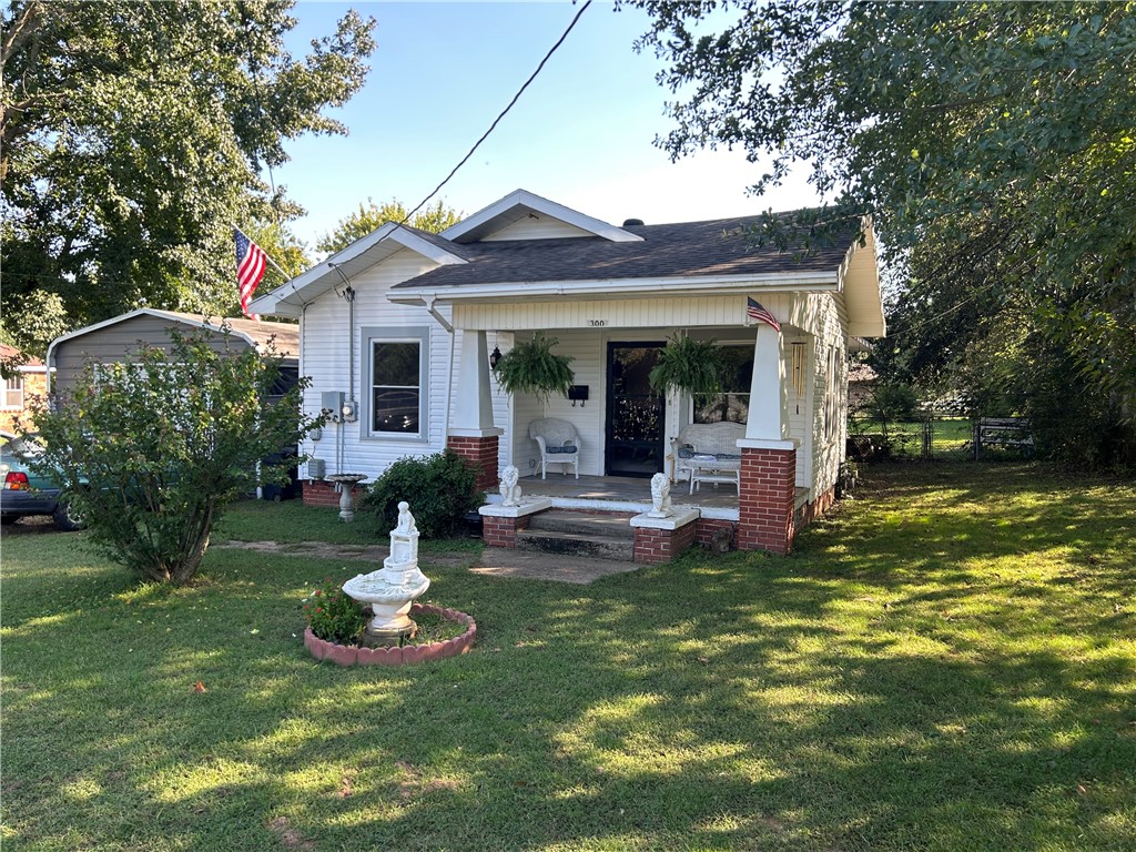 Foundation is closed piers.
Range & Fridge are both brand new as well as the windows, the gas hot water tank. Also has newer carpet!
The porch is covered, and the house does have dimensional shingles, not including the 18x21 detached garage off to the side of the house.