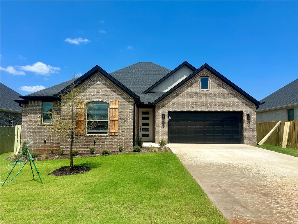 Pea Ridge welcomes you to its rapidly growing community. The Yorktown subdivision places you at the heart of it all, offering close proximity to schools, parks, and beautiful scenic views. The Mallard plan greets you with a split floor design, placing all secondary bedrooms at the front and side of the home, while the primary bedroom is nestled in the back for added privacy. LVP flooring runs throughout the main living areas and laundry room, adding a touch of elegance to the open-concept layout. The primary bedroom offers a sense of seclusion yet provides easy access to the kitchen and living room. This plan also features a standout covered back patio, an electric fireplace, 3CM granite countertops throughout, and a gas range.For a limited time rates starting at 4.99% OR $7,500 from builder & up to $4K from preferred lender. For access to see all the homes stop by the model home at 1602 Christman St. Open Monday, Tuesday,Thursday, and Friday from 10-4 and Sunday 1-4.