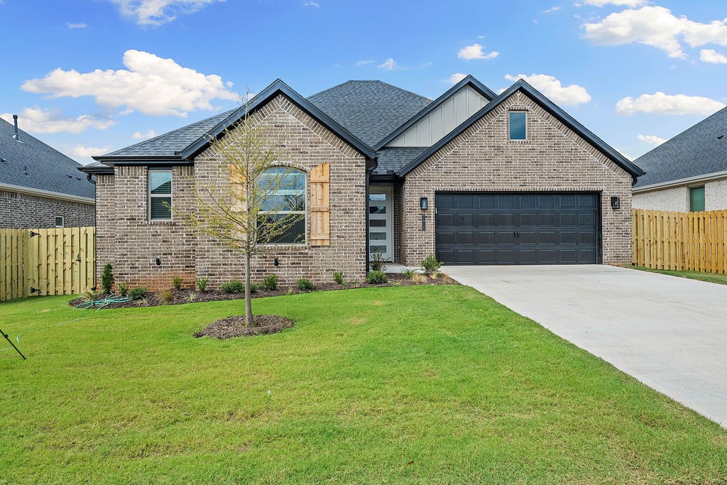 Pea Ridge welcomes you to its rapidly growing community. The Yorktown subdivision places you at the heart of it all, offering close proximity to schools, parks, and beautiful scenic views. The Mallard plan greets you with a split floor design, placing all secondary bedrooms at the front and side of the home, while the primary bedroom is nestled in the back for added privacy. LVP flooring runs throughout the main living areas and laundry room, adding a touch of elegance to the open-concept layout. The primary bedroom offers a sense of seclusion yet provides easy access to the kitchen and living room. This plan also features a standout covered back patio, an electric fireplace, 3CM granite countertops throughout, and a gas range.For a limited time rates starting at 4.99% OR $7,500 from builder & up to $4K from preferred lender. For access to see all the homes stop by the model home at 1602 Christman St. Open Monday, Tuesday,Thursday, and Friday from 10-4 and Sunday 1-4.