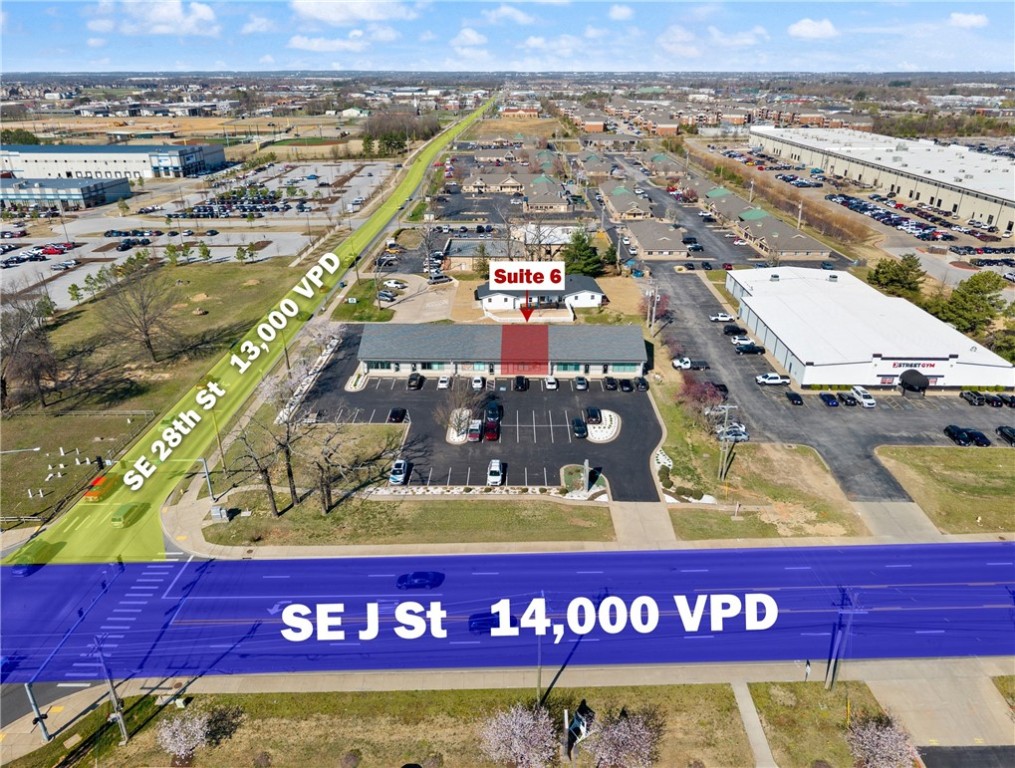 +/- 1,500 SF of prime office/medical space available in a highly visible corner location at the SE J St (14,000 VPD) and SE 28th St (15,000 VPD) intersection. This suite features a welcoming reception and waiting area, an open exam room area, two restrooms, a kitchen, a private office, and plenty of storage rooms. The property offers frontage on SE J St with dedicated monument signage, providing excellent exposure. Just two minutes from SE Walton Blvd, less than five minutes from the new Walmart HQ, and only 10 minutes to Downtown Bentonville. A functional layout and strong traffic counts make this an ideal space for professional or medical users.