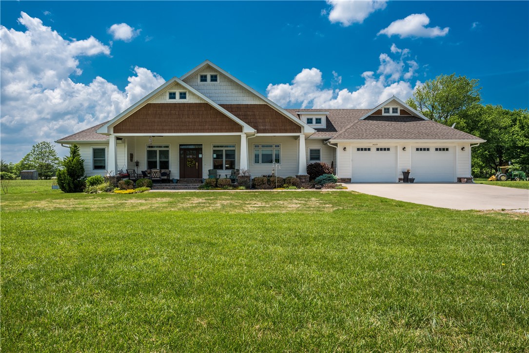 This one is what everyone wants, newer house with extra room and incredible views close to all NW Arkansas has to offer. Don't miss this one upgraded amenities with all you would expect in a higher end homes without the cost. Open, split floor plan, tastefully decorated, kitchen island, butlers pantry, and a spacious laundry room, wood floors and a propane stove in the living room for added comfort, oversized garage with extra storage, attic storage, complete with sprinkler system for yard and landscaping as well. Water filtration put in for personal preference, not required. 10x30 covered front porch and 12x20 covered back porch. You will not be disappointed.