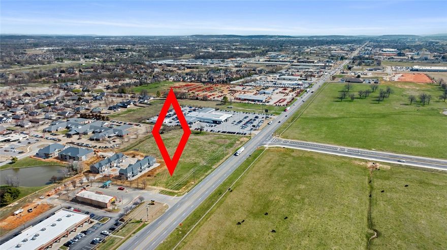 Fantastic lot Harber Meadows PUD with frontage on Hwy 412/Sunset. Superb location for your business. Over 33,000 CPD waiting to pull into your place. Hotels, dining, rooftops all around. All utilities on site!