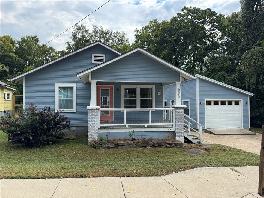 Just steps from Historic Downtown Fayetteville, this charming Craftsman-style home offers the perfect mix of character and modern updates. With 2 bedrooms, 1 bathroom, and a bonus room across 1,056 square feet, there’s plenty of space to make yourself at home. The private backyard is a rare find—enjoy the peaceful setting with a flowing brook, mature trees and a brand-new deck, perfect for relaxing or hosting friends. A 14’x24’ garage provides extra storage or room for hobbies. Located in the heart of Fayetteville, you’ll be within walking distance of Dickson Street, local restaurants, breweries, the Razorback Greenway, and the University. This home offers a lifestyle that’s hard to beat—quiet, cozy living with all the best of the city just around the corner.