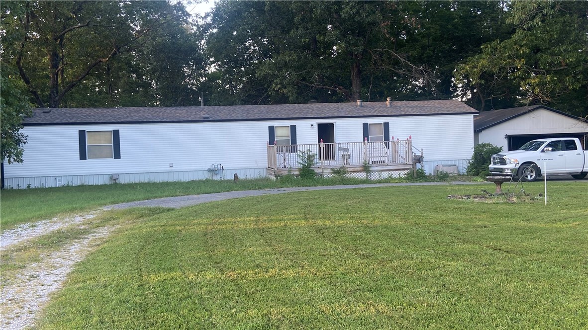 Enjoy this Singlewide 16x76 Skyline brand Mobile Home with Detached 24X24 2 Car Garage situated on 2 peaceful acres. The HVAC and Roof replaced within last 2 years. Owners in process of vacating. Priced low and Being SOLD AS IS.
