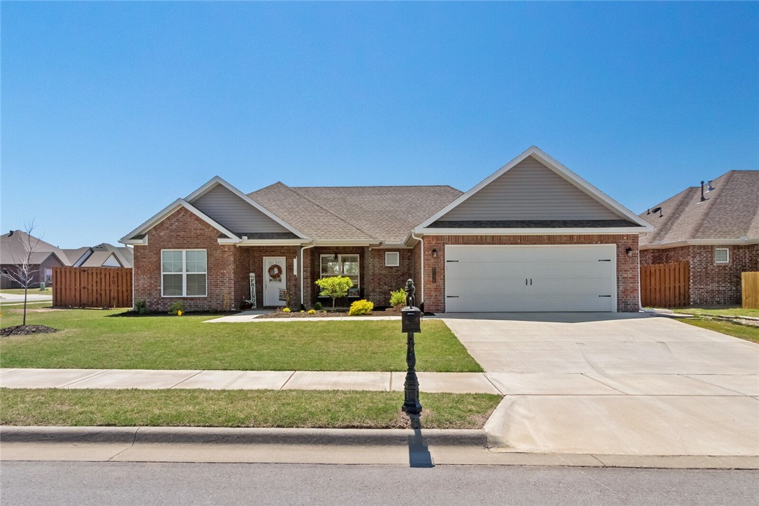 Better than NEW with ALL the EXTRAS! Built in 2021, this Beautiful 3 bedroom, 2 bath home in Hazelton Heights sits on a corner lot and has a double-gate with access to the fenced in backyard that has been professionally landscaped around the refreshing 32x16x52 above ground pool installed by Burton Pools. The pool is up and running, ready for the hot summer months ahead or it can be removed if Buyer prefers. At the front of the house walking to the front door you first encounter a welcoming porch. The foyer takes you into the Living room with a vaulted ceiling and exposed beams. The open concept into the kitchen gives you a spacious feel to the area. Eat-in kitchen with additional bar seating gives you room when family and guests come to visit. Don't forget to check out the extended patio area which is great for entertaining and swim parties. $20,000 worth of combined landscaping in the front and back yards. 7x7 storage building conveys. Call today and schedule a showing. You'll be glad you did.