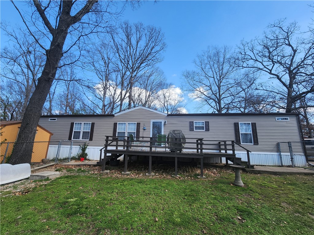 Great Opportunity to own a piece of Bella Vista! This home is within minutes of Bella Vista Lake Park and Cooper Elementary School, and has great potential for appreciation.