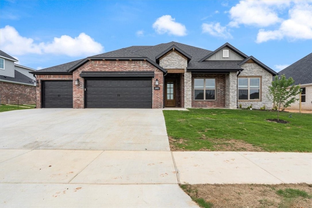 Concessions Include: up to $3500 from the Builder towards closing costs not to mention get the blinds, fence and gutters included. Welcome Home to Arlington Subdivision in Pea Ridge! Situated directly across AR-94 from Pea Ridge Schools and a short drive to all Northwest Arkansas has to offer. The Anna Plan features a four bedroom split floor plan and three bathrooms. Features include: granite countertops, beams in the living room and primary suite, custom trim and gas log fireplace in the bright and airy Living Room. A formal dining room and custom touches like a large pantry with barn doors, designer lighting and so much more! Come by and see all the details! Open House every Sun 1-4!