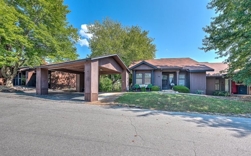 Excellent starter home or investment. All Bella Vista amenities, backs up to golf course. In 2018 roof, HVAC, appliances, hot water heater and flooring were all replaced. Includes 2 car carport. HOA is $75 and sewer is $23 a month. Adjacent to Greenway and paved trails. #2 Green of Metfield golf course in backyard.