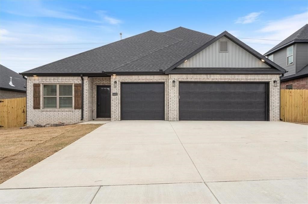 Welcome to a beautiful home in a vibrant new Bentonville subdivision! This beautifully designed new construction home boasts a spacious split floor plan with custom built cabinets & a large kitchen island, perfect for entertaining. The inviting living room features a cozy fireplace, while the kitchen is equipped with a stylish wine rack for all your favorites. Enjoy luxurious touches throughout, including elegant wood flooring, 2 inch faux wood blinds, & rain head showers in the bathrooms. The master suite offers a custom tile shower & tub, complemented by generous walk-in closets. With an eat-in kitchen, covered back patio, & a fenced yard, this home is ideal for family gatherings & outdoor living. Plus, you’ll appreciate the convenient location just 10 minutes from XNA Airport.