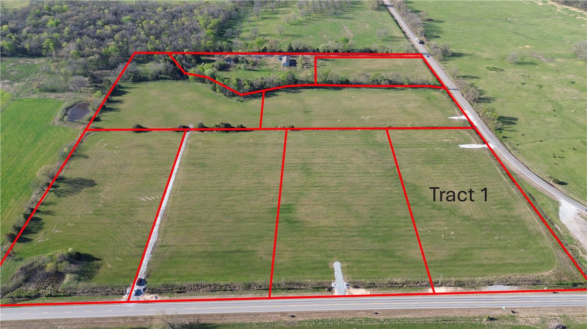 Tract 1 is located at the corner of HWY 102 and HWY 43 in western Benton County. Upon finalization of the survey/plat, Tract 1 will be 5 m/l acres. Located off of paved road with electric and rural water at the street, this tract provides an excellent opportunity to live in the country but have convienent access to Gravette, Decatur, Siloam Springs and the rest of NWA.