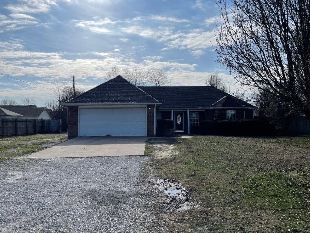 Opportunity is knocking! All brick home on 1.51(+/-) acres just inside the city limits near the business district but with a country feel! Split floor plan, this home is ready for a complete renovation to make it fit your needs. Sold AS-IS, no repairs. This property may qualify for seller financing (Vendee).