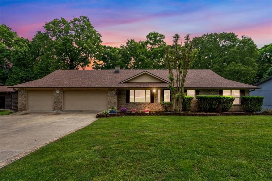 Close to the lake with LOW electricity bills ! With Shine Solar panels, current sellers enjoy electric bills ~ $55/month. Embrace the lake area lifestyle in this spacious home in a prime location in the Ozarks.  Situated in a serene setting, this home is less than 5 minutes to 3 public Beaver Lake beaches, boat launches, and downtown Rogers ! The bright, open kitchen boasts a central island, abundant storage, and plenty of natural light throughout. Oversized 3-car garage includes a workshop area with 220V wiring. Lower level features a versatile family room that can serve as a media/game room, in-law suite, or teen retreat. A cozy office space is situated between floors, providing a quiet place for work or study. Recently updated paint, lighting, showerheads, fixtures & hardware ! Updates include $20K HVAC system installed ~ 2 years ago along with $3000 added insulation-Shine Solar panels which will be paid off at closing. Owens Corning Duration Designer roof and gutters ~6 years old. Wired for Brinks Security