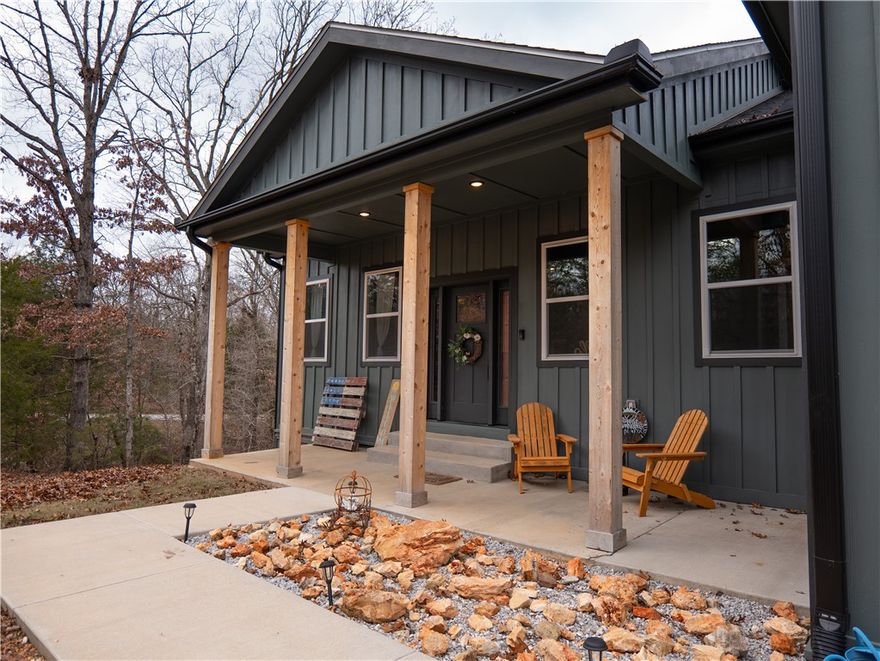 Check out this custom built, energy efficient home just minutes from NWA. This recently built home is just minutes from town & Beaver Lake, offering seclusion & convenience. Tall ceilings combined with modern finishes & wood accents create a spacious, yet cozy feel. The main level includes an open concept kitchen & living area great for entertaining. Highlights include granite countertops throughout, a walk-in pantry & an electric fireplace complete with a mantle crafted of reclaimed wood from the property. The lower level features a bonus living space ideal for a home theater or multi-generational living. Exterior features include Hardie board siding, Trex composite decking & 220V wiring for a future hot tub or RV hookup. The fenced in backyard is complete with fire pit and storage shed. Smart home features include MyQ direct-drive garage door motors & smart thermostats. The massive garage provides ample room for boat and automobile storage & is equipped with a sink & floor drain. Builder's warranty to transfer!