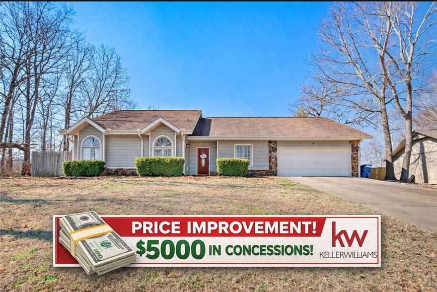 SELLER OFFERING $5000 in concessions > A must-see 3-bedroom, 2-bath home featuring a desirable split floor plan and comfortable living spaces with a huge back yard. Located in a wonderful neighborhood in Bella Vista within the Gravette School District. This home sits on a large lot that is nearly half of an acre, perfect for entertaining and gardening. Enjoy great community amenities including a pool, playground, and tennis courts.  Only one minute from Highlands Golf Course and Clubhouse. Enjoy quiet evenings on the back porch with a peaceful natural setting, perfect for relaxing. Spacious bedrooms and a must see master bath, perfect for relaxation. This home offers an enclosed entryway bonus room, not included in the square footage. Conveying with this lovely home is a washer and dryer bought in 2025 and the refrigerator. The dishwasher was purchased in 2024, and a brand new microwave was purchased in 2026. Upgraded appliances are a huge win! This home offers both comfort and location—schedule your showing today!