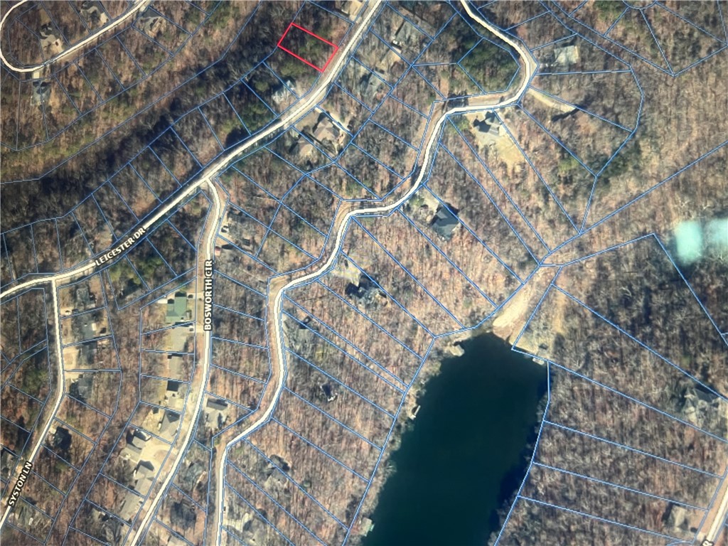 Great Lake Ann area Lot!! Well developed street and neighborhood. Lake Ann is a 112 acre lake and is one of 3 motor boat friendly lakes. Lake Ann stands out and is known for her incredible shoreline of rocky limestone bluffs and outshoots. Lake Ann is fed by a spring that erupts in the lake-bed adjacent to a Park and Pavillion that keeps the water clear and cold. Due to this, Lake Ann is the most popular for nature
lovers. Capitalizing on its unique beauty, Lake Ann has amenities on both ends of the lake and is stocked with a wide variety of indigenous fish. Amenities include a courtesy dock, Lake Ann Pavilion, a fish cleaning station, picnic tables, grills, a multi-use dock, a fishing-only dock, an automatic fish-feeder, nighttime fishing lights and restrooms. Her Limestone walls and clear Spring water is what gives Ann her beautiful,
clear Emerald look. Special Lake in a special community. Make the beautiful Ozarks a part of your life pattern!