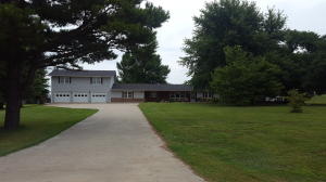 Beautiful edge of town country setting for this newly remodeled, well maintained home. This amazing home includes 4 or 5 bedrooms, 3 full bathrooms, sunroom, over sized 3 car garage and tons of storage, and out building, all on a beautiful 3 acre lot with large trees making for a great shade. This home will be great for a growing family or entertaining! You will want to see this home!