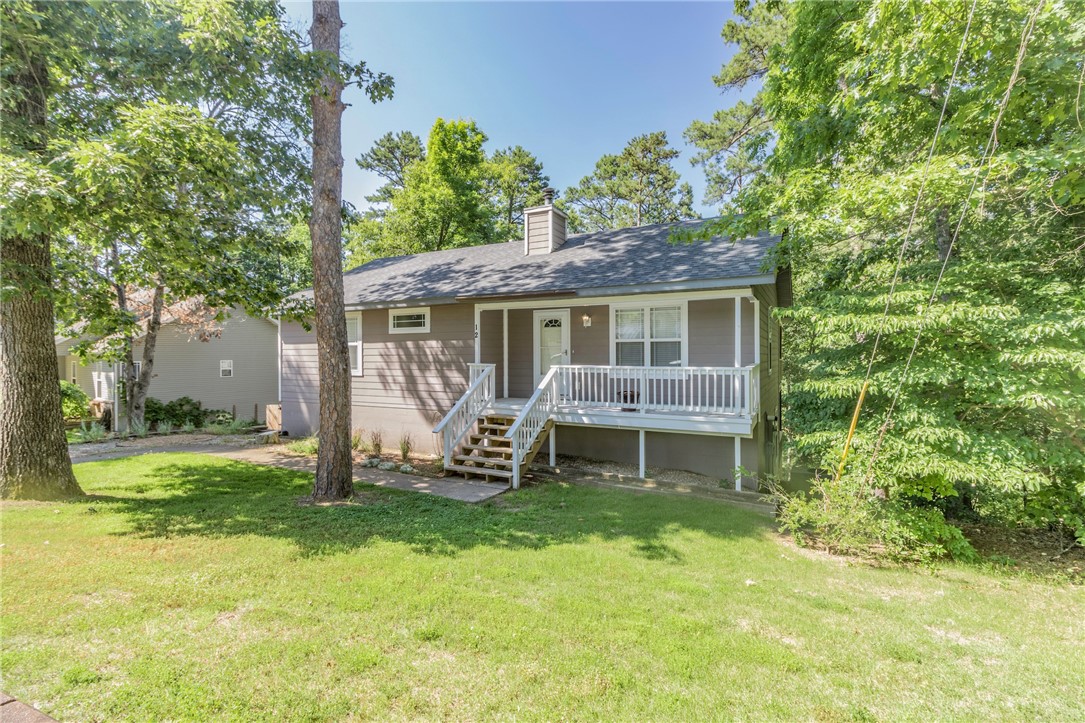 This charming home has a desirable location with easy access to Hwy 71/Bella Vista Way and close proximity to The Back 40 Loop mountain biking trail. With an open floor plan incorporating the main living area and kitchen, this home provides a great layout for everyday living and entertaining. You will love the large kitchen with modern appliances and abundant natural light. A second living area or an optional 4th bedroom located in finished walk out basement. 2.5 car garage with built in cabinets provides ample room for storage, new roof (2020), hot tub, repainted interior, and upgraded light fixtures are the icing on the cake for this move in ready home. With its inviting ambiance, modern features, convenient location, and recent upgrades (roof, paint, lighting), you do not want to miss out on this one.