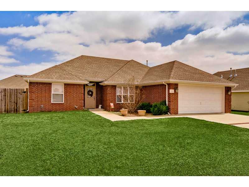 FORMAL DINING OPEN INTO LARGE LIVING RM WITH FIREPLACE, DARK CUSTOM CABINETS, WALK TO ELEM SCHOOL, BEAUTIFUL FIXTURES, EAT IN KITCH, WHIRLPOOL APPL. SPLIT FLOOR PLAN, WOOD PRIVACY FENCE
