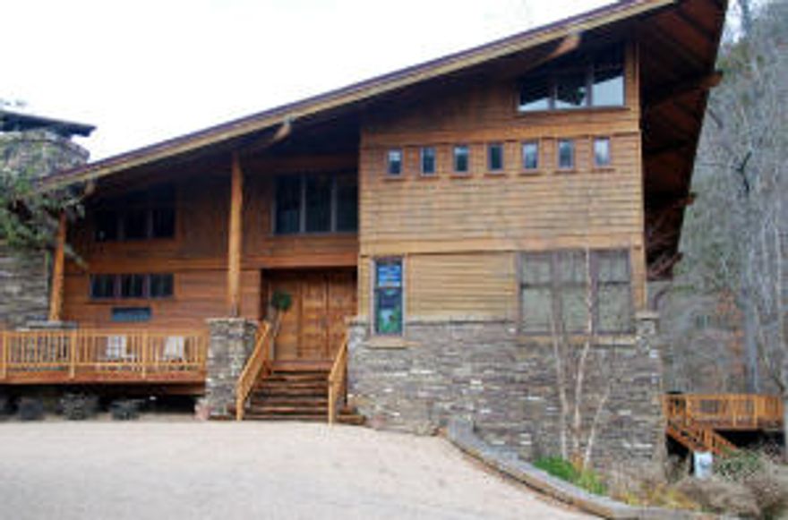 Check out this one of a kind residence, vacation home or tourism business. This amazing lodge sleeps 20 and the separate rented cabin sleeps 2-3 more. Perfectly located in Ponca, Arkansas on 4+ acres, only 1/4 mile from the Buffalo River National Park and less than a mile from the Ponca put-in on the Buffalo River and elk-viewing in the Boxley Valley. This spectacular lodge/home has approximately 6000 sq ft (per Assessor), 4 master suites each with jetted tubs and separate showers, sitting areas and screened-in porches. There are also 2 sleeping lofts for extra guests. Two spacious living areas with cathedral ceilings and a wood burning fireplace. The kitchen is every woman's dream!