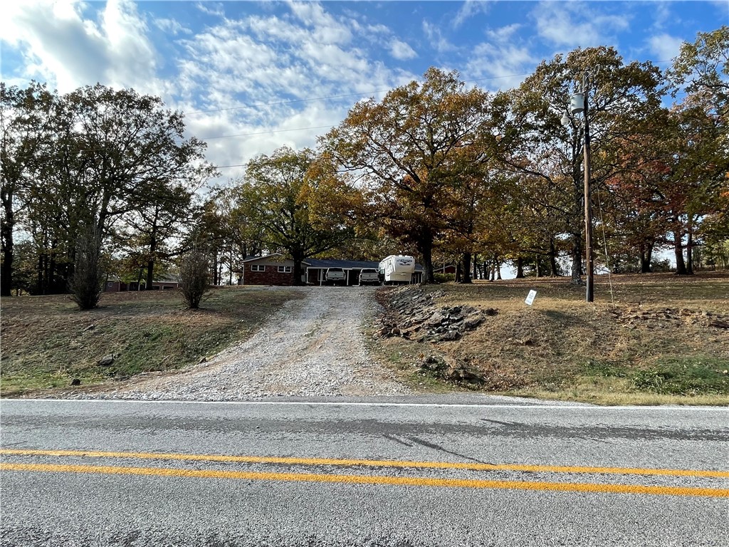 This charming property is located just outside the serene and picturesque town of West Fork, Arkansas, offering a unique opportunity for peaceful living in a beautiful natural setting. The property encompasses [2.16 ac & and is surrounded by the scenic beauty of the Ozark Mountains.
Only 20 minutes from the center of fayetteville, shopping, hospitals and the U of A. Very nice country home with detached shop, outdoor fire pit & plenty of room for outdoor entertaining. Devils den state park just 3 mile away with camping, fishing & hiking in some of the most beautiful mountains in Arkansas. Sit on your back porch and watch to beautiful sunsets, and the mornings will bring that picture perfect sunrise to your front porch. Come find your freedom!