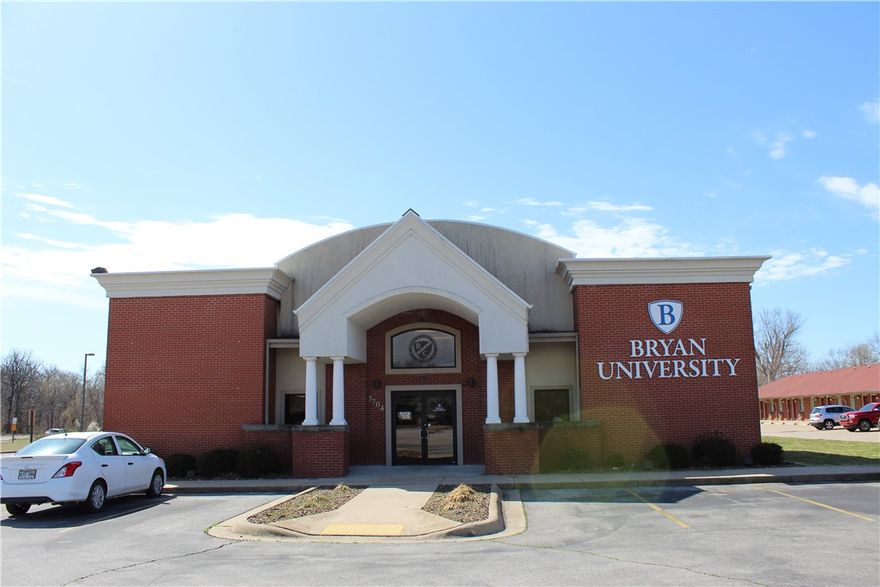 Building currently utilized by university, but could be converted to office or retail. Located on busy Walnut St and less than 5 minutes to I-49. Surrounded by restaurants, retail, and entertainment. Reception area with surrounding offices. 55 parking spots. 11 classrooms. Storage area in the back. Breakroom with kitchenette